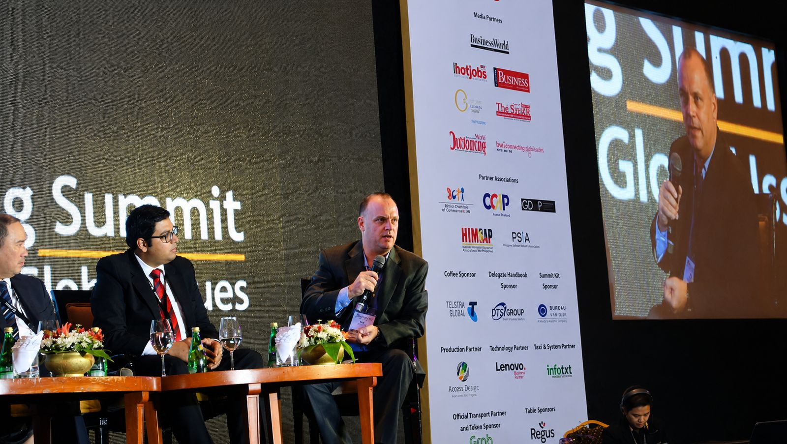 Ralf Ellspermann on a panel at an outsourcing industry event