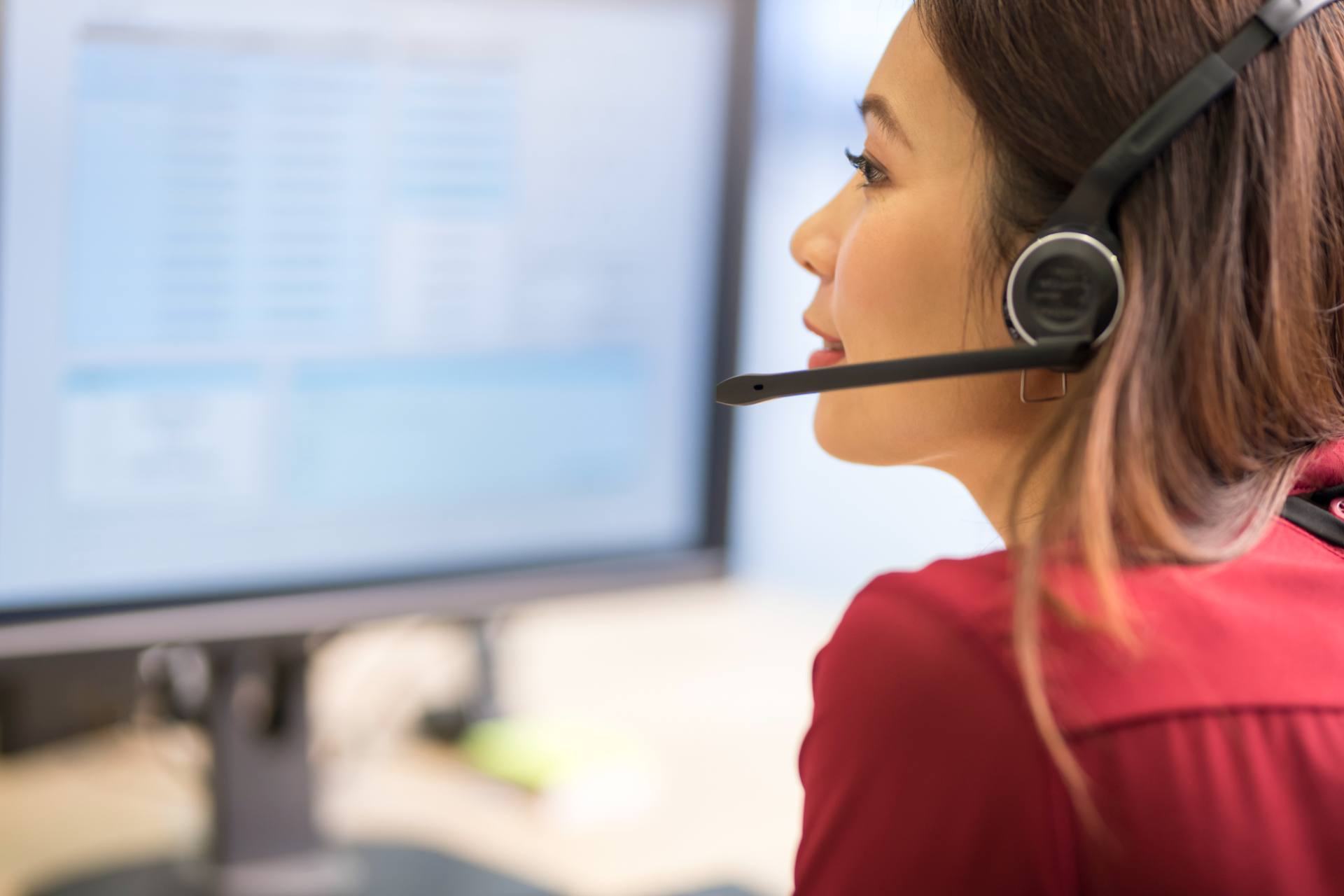 Customer service agent wearing a headset at a Philippine call center