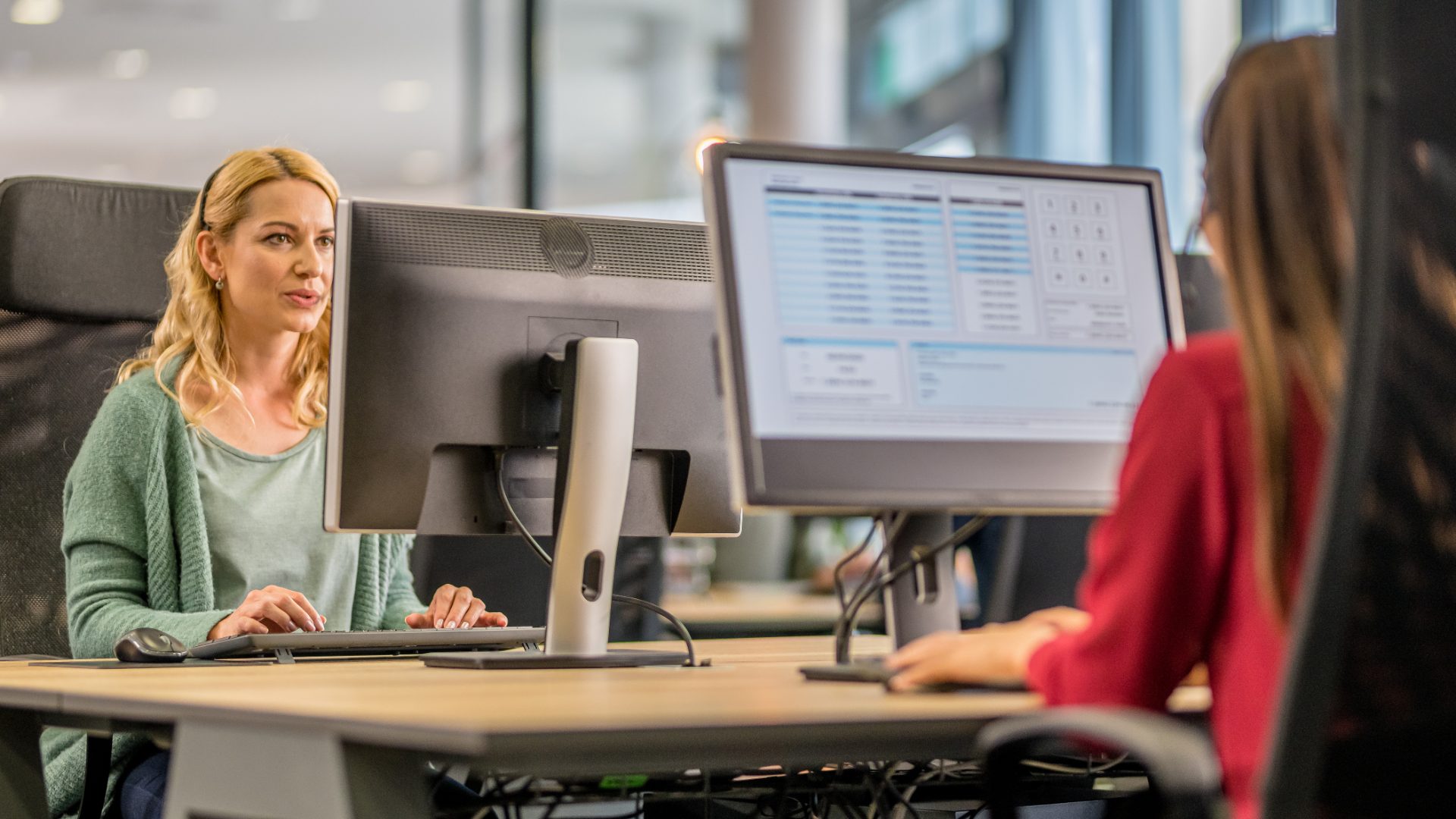 Operations specialists monitoring live fleet and system dashboards on multiple screens, representing AI, robotics and autonomous vehicle operations outsourcing to the Philippines