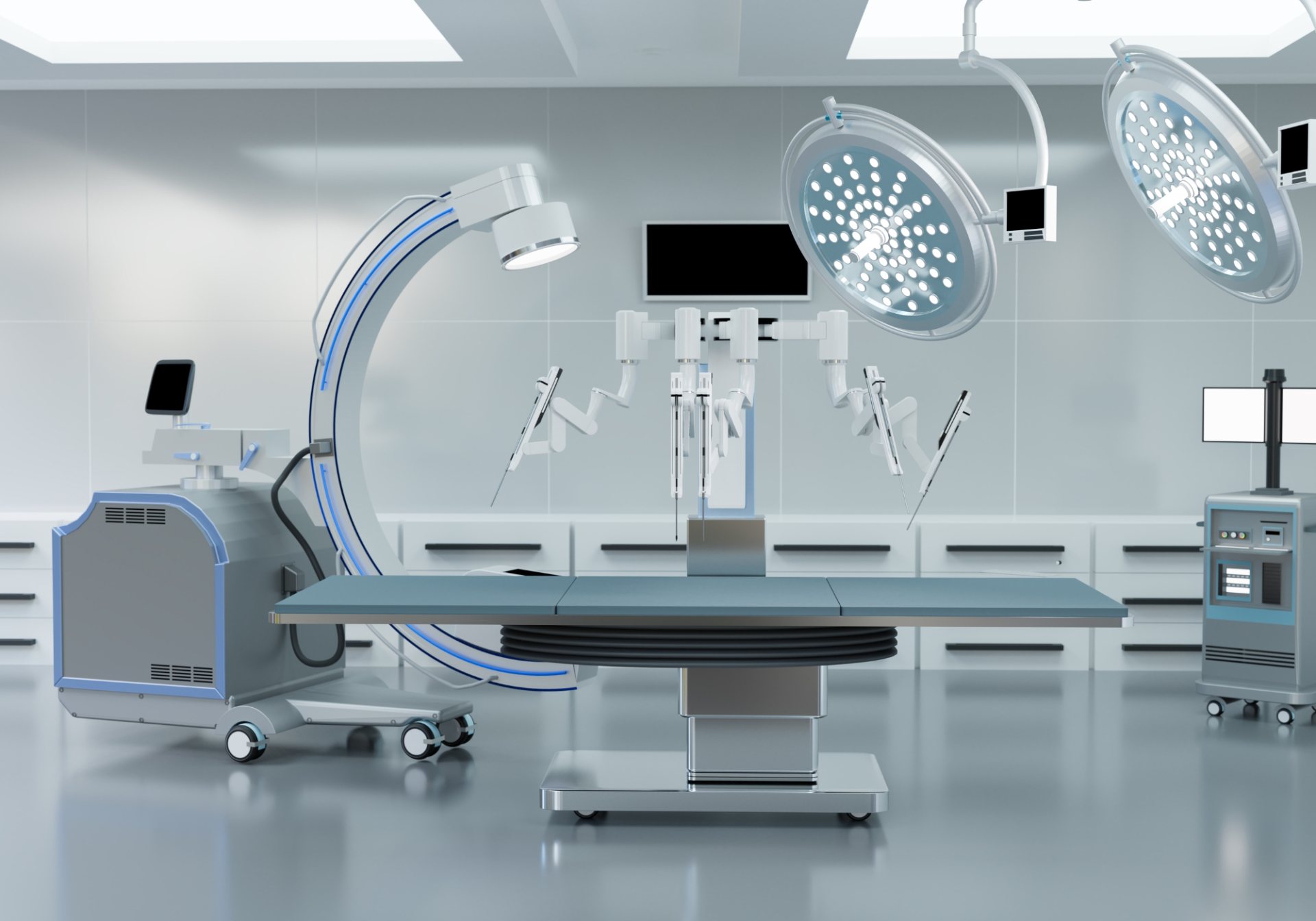 Robotic surgical system and C-arm imaging unit in an operating room, equipment behind medical device service work