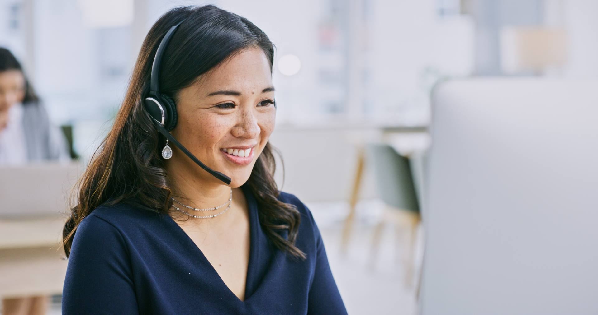 Medical records specialist with headset coordinating record requests at a Philippine healthcare outsourcing provider