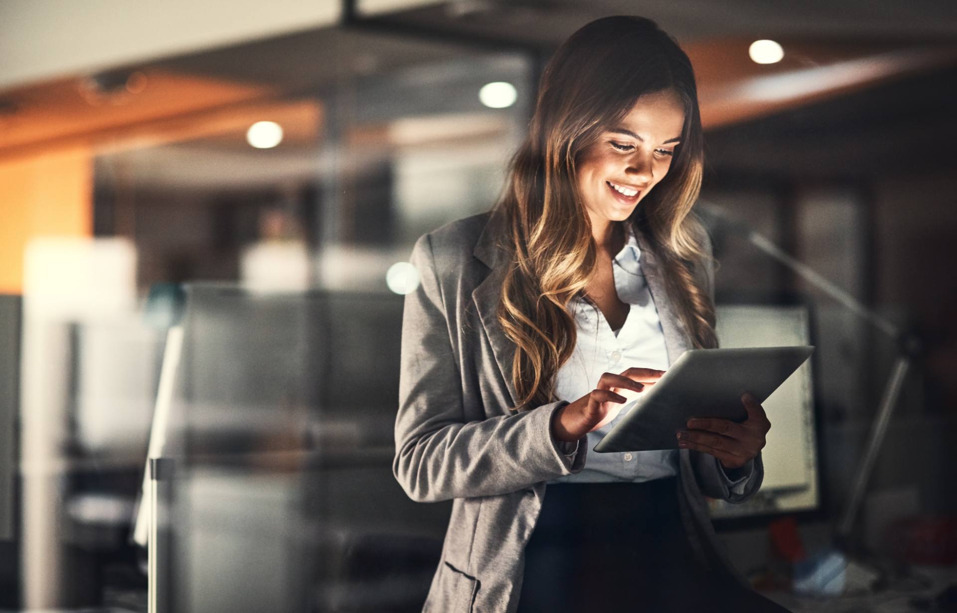 Publishing professional reviewing digital content on a tablet