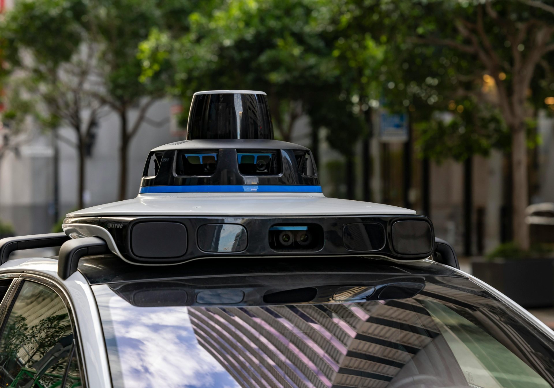 Roof-mounted LiDAR and camera rig on an autonomous test vehicle, for a post on driving data collection campaign planning